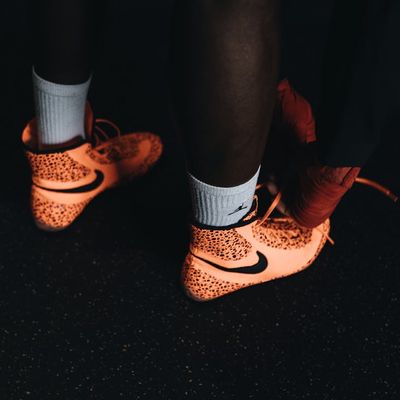 Close up of sports shoes on a gym floor